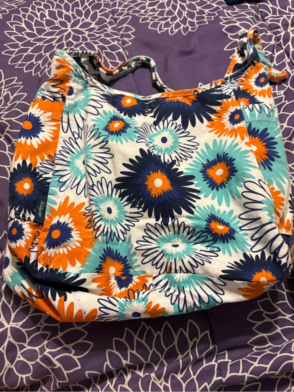 Thirty-One Gifts Paradise Pop & Navy Wave reversible hobo bag.